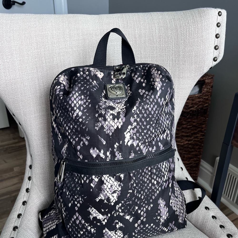 Retired Brighton Happy Trails Backpack